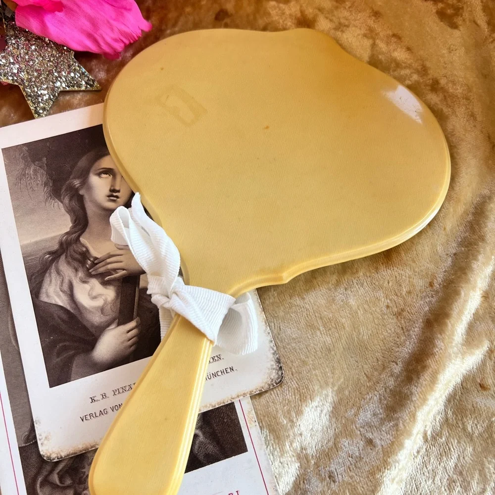 Vintage Celluloid Beveled Handheld Mirror with White Bow